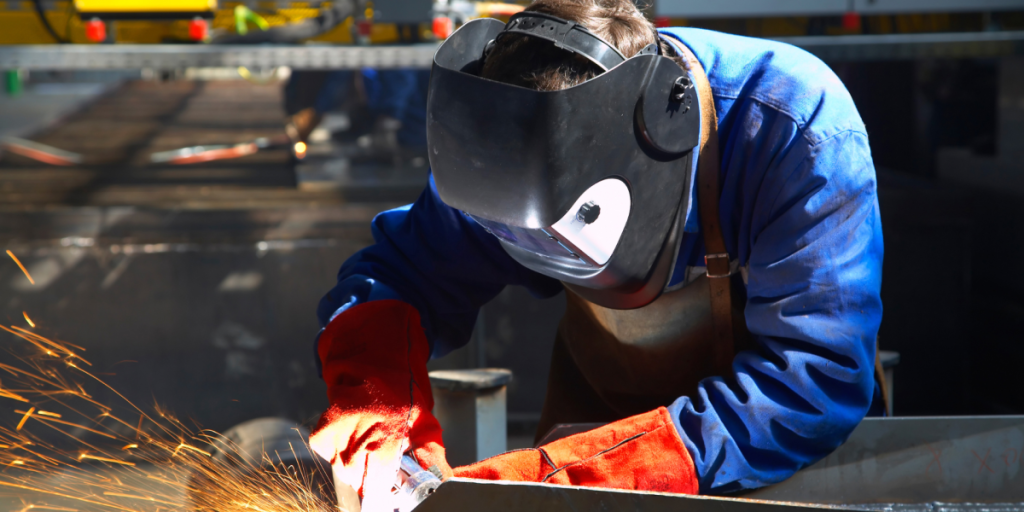 "Skilled technical manpower supply services in UAE including certified structural welders and industrial electricians working on a construction site"